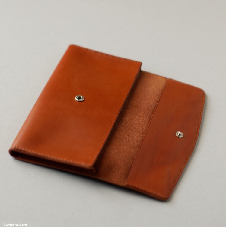 kumosha's handstitched leather pouch